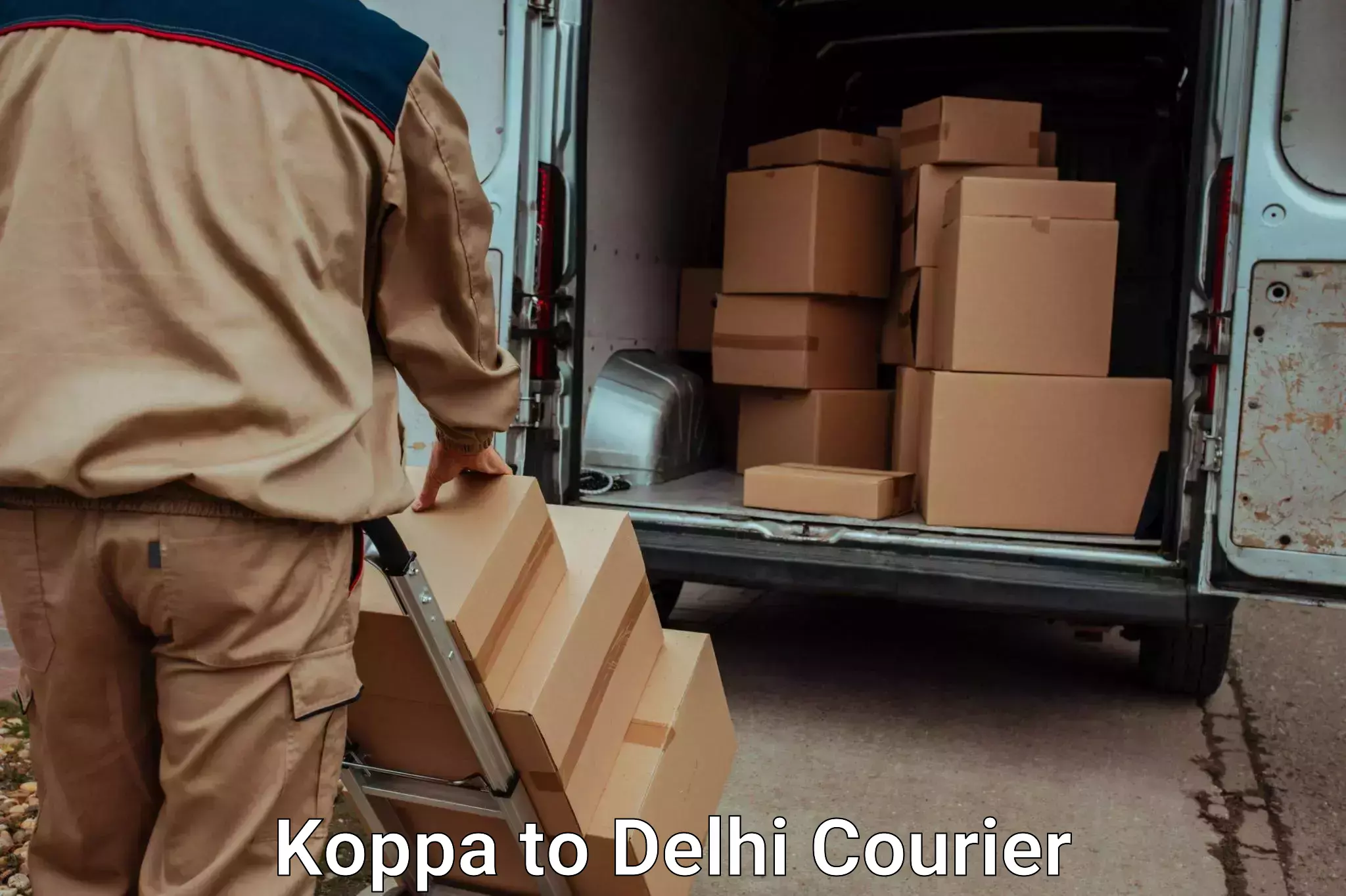 Household goods transporters Koppa to East Delhi