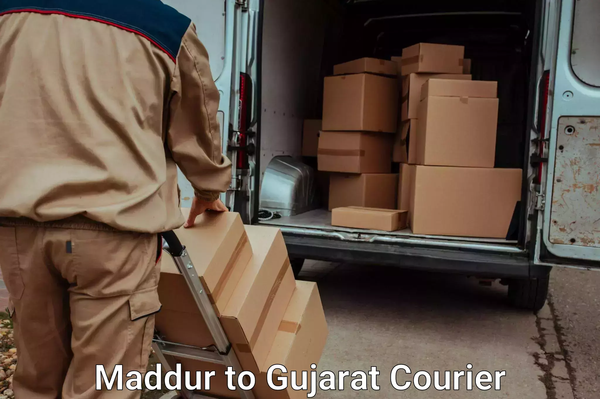 Professional moving company Maddur to Gujarat